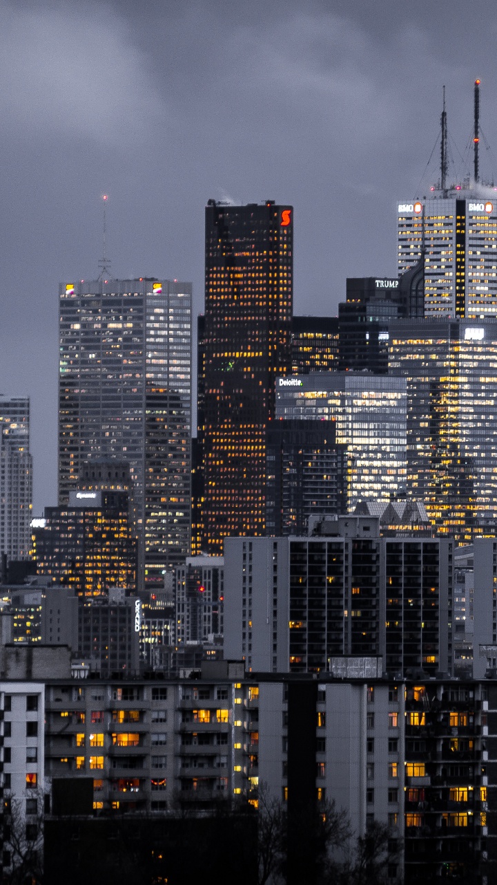 City Skyline During Night Time. Wallpaper in 720x1280 Resolution