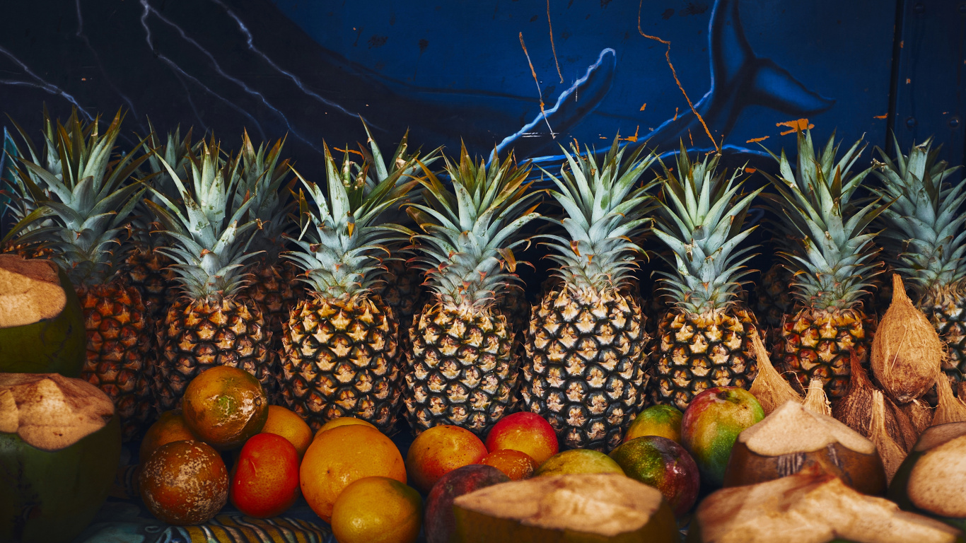 Pineapple and Orange Fruits on Brown Wooden Table. Wallpaper in 1366x768 Resolution