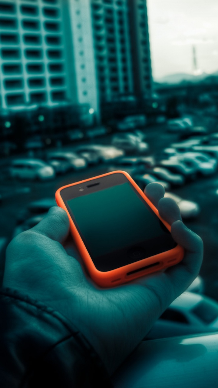 Person Holding Black and White Smartphone. Wallpaper in 720x1280 Resolution