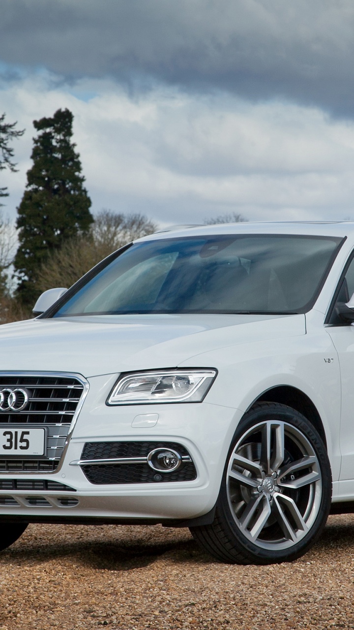 White Audi Suv on Brown Dirt Road During Daytime. Wallpaper in 720x1280 Resolution