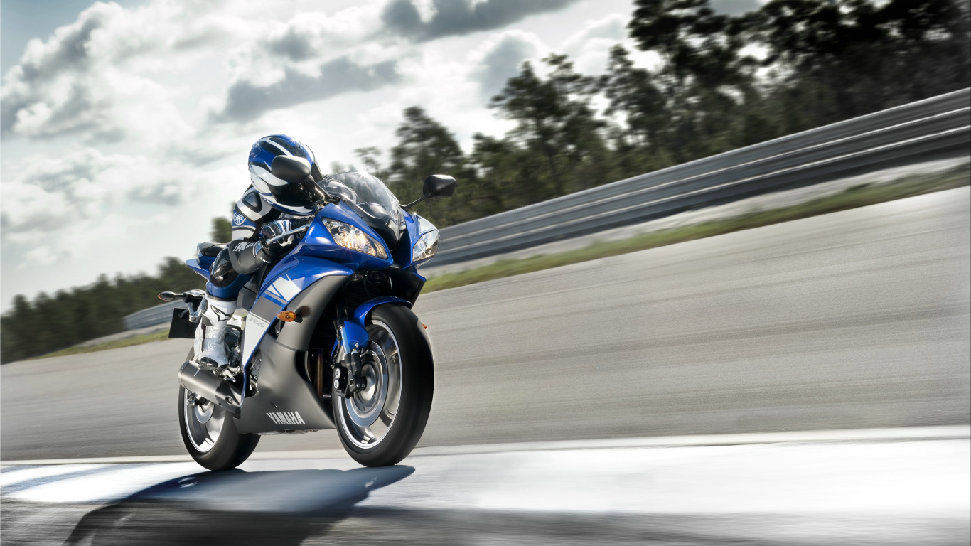 Man in Blue and White Jacket Riding Blue and White Sports Bike. Wallpaper in 1366x768 Resolution