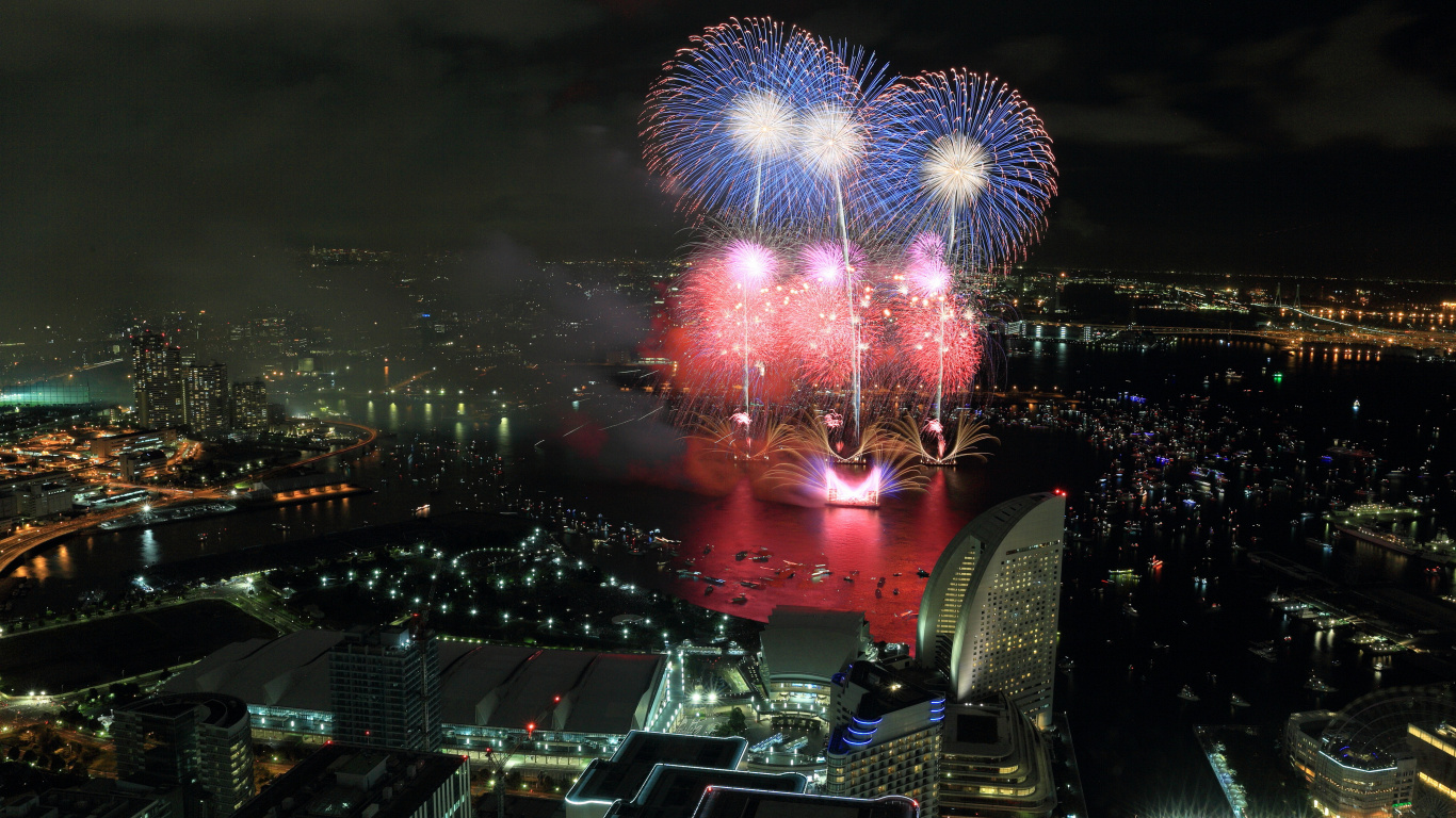 Stadt Mit Hochhäusern Während Der Nacht. Wallpaper in 1366x768 Resolution