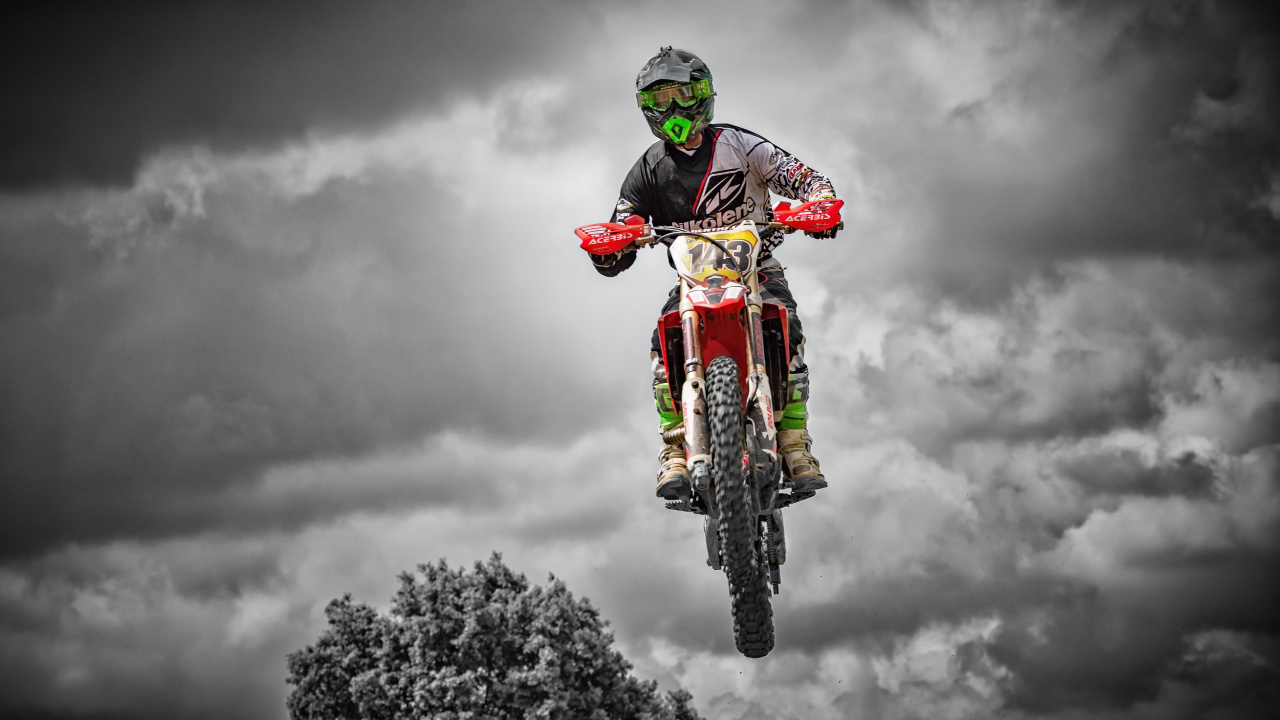 Man in Red and Black Motocross Suit Riding Motocross Dirt Bike. Wallpaper in 1280x720 Resolution