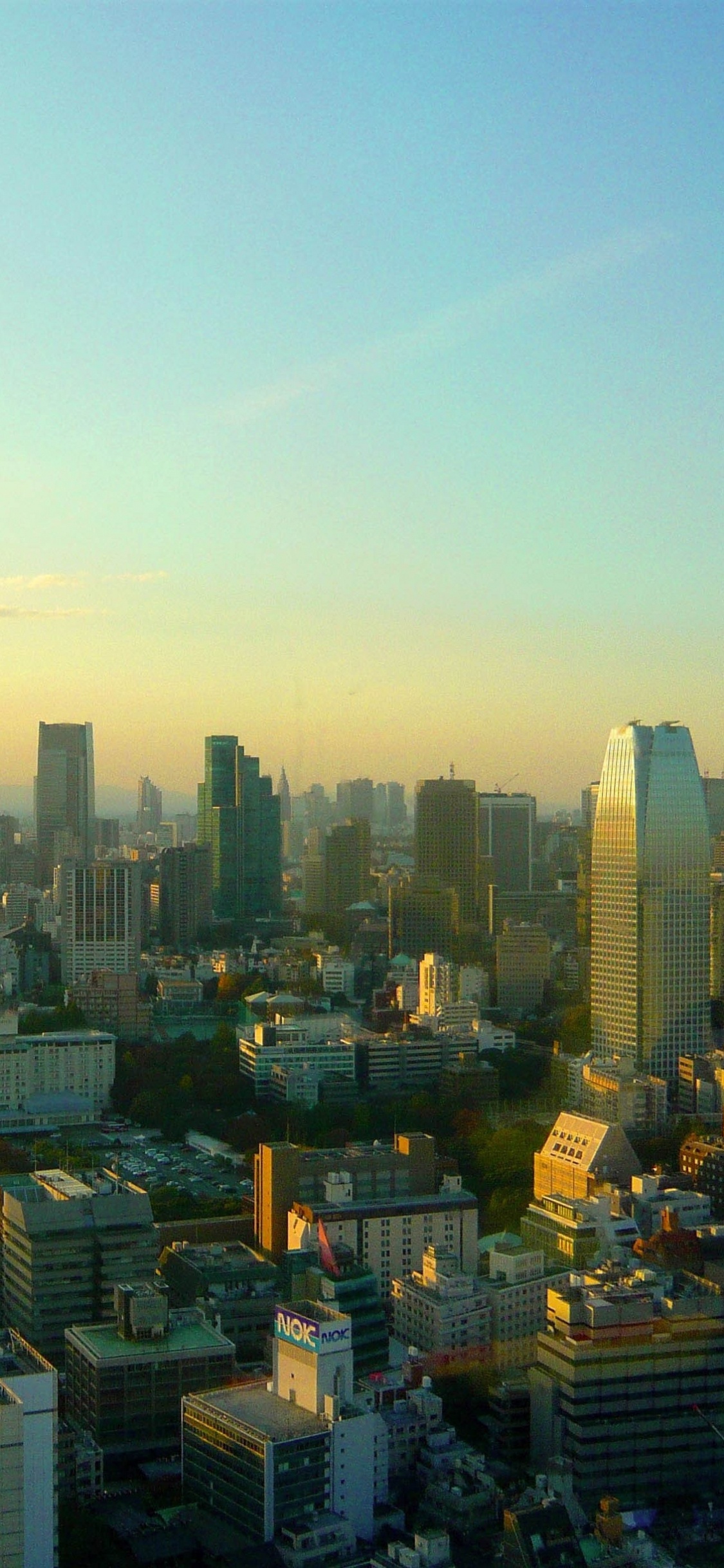 Aerial View of City Buildings During Daytime. Wallpaper in 1125x2436 Resolution