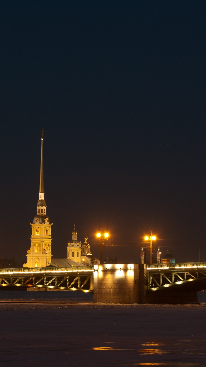 Lighted Bridge During Night Time. Wallpaper in 720x1280 Resolution