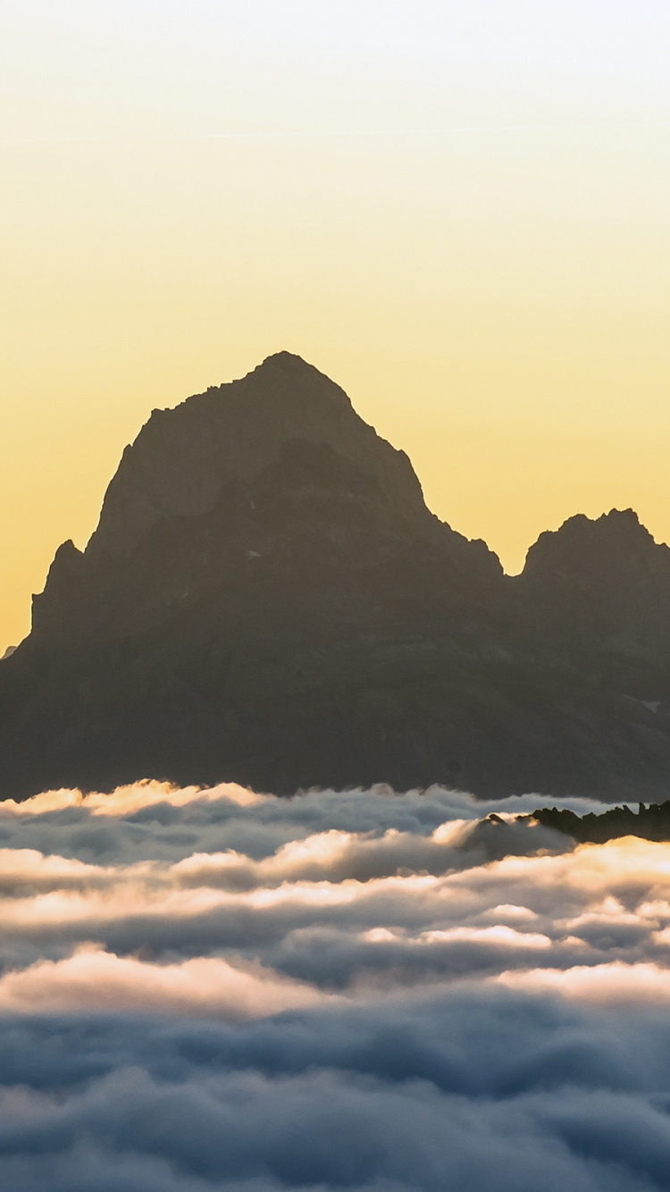 Silhouette of Mountain During Daytime. Wallpaper in 750x1334 Resolution