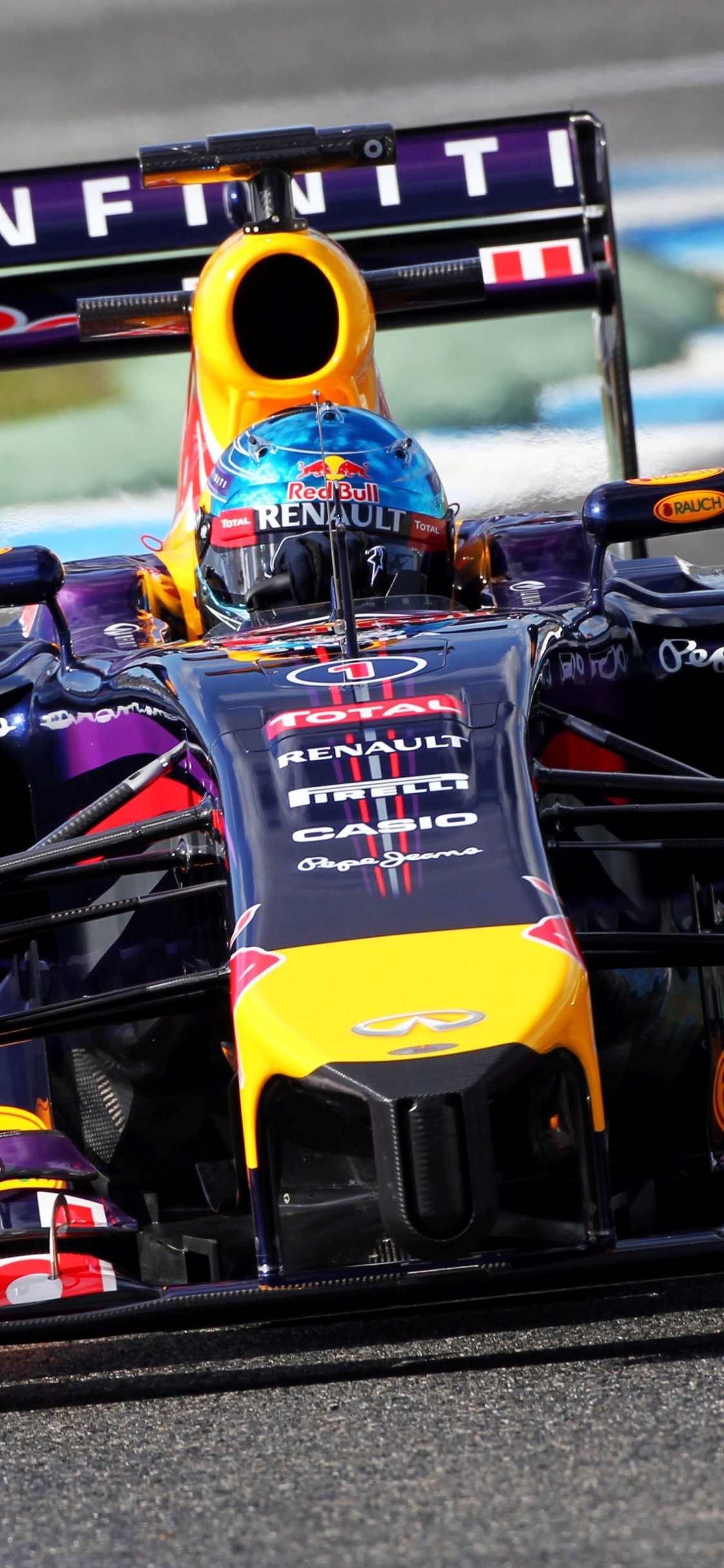 Yellow and Black f 1 Race Car on Track. Wallpaper in 1125x2436 Resolution