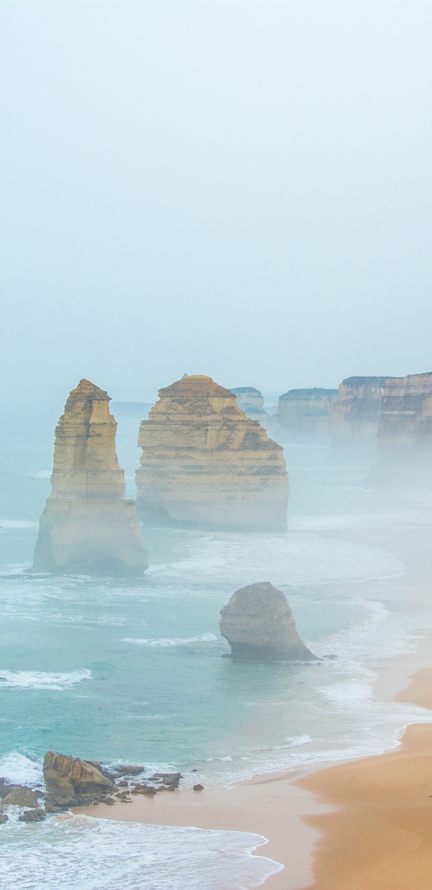 Brown Rock Formation on Seashore During Daytime. Wallpaper in 1440x2960 Resolution