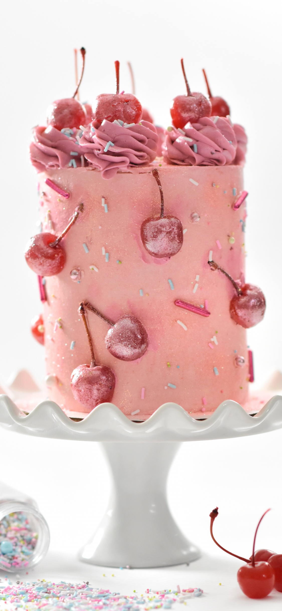 Pink and White Cake on White Table. Wallpaper in 1125x2436 Resolution