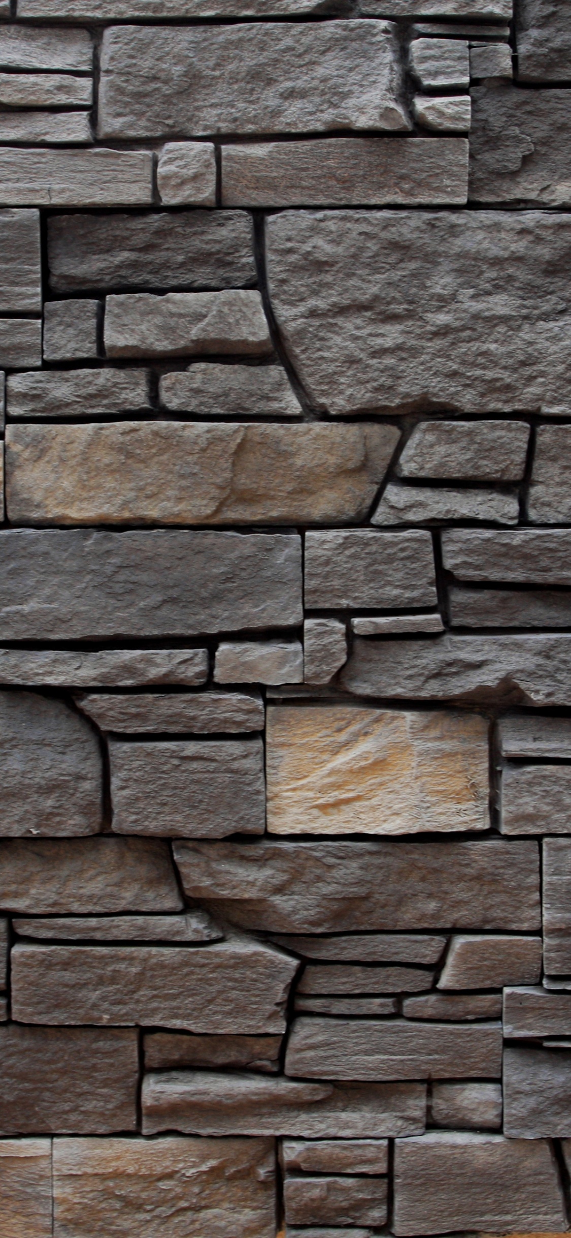 Brown and Grey Brick Wall. Wallpaper in 1125x2436 Resolution
