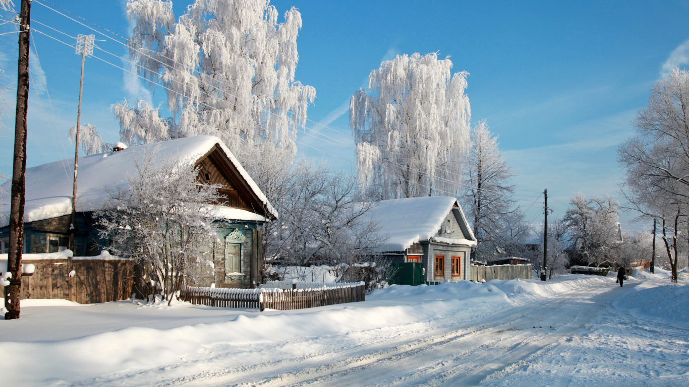 Brown Wooden House Near Trees Covered With Snow Under Blue Sky During Daytime. Wallpaper in 1366x768 Resolution