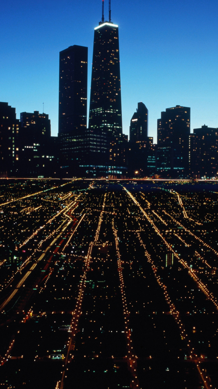 City Skyline During Night Time. Wallpaper in 750x1334 Resolution
