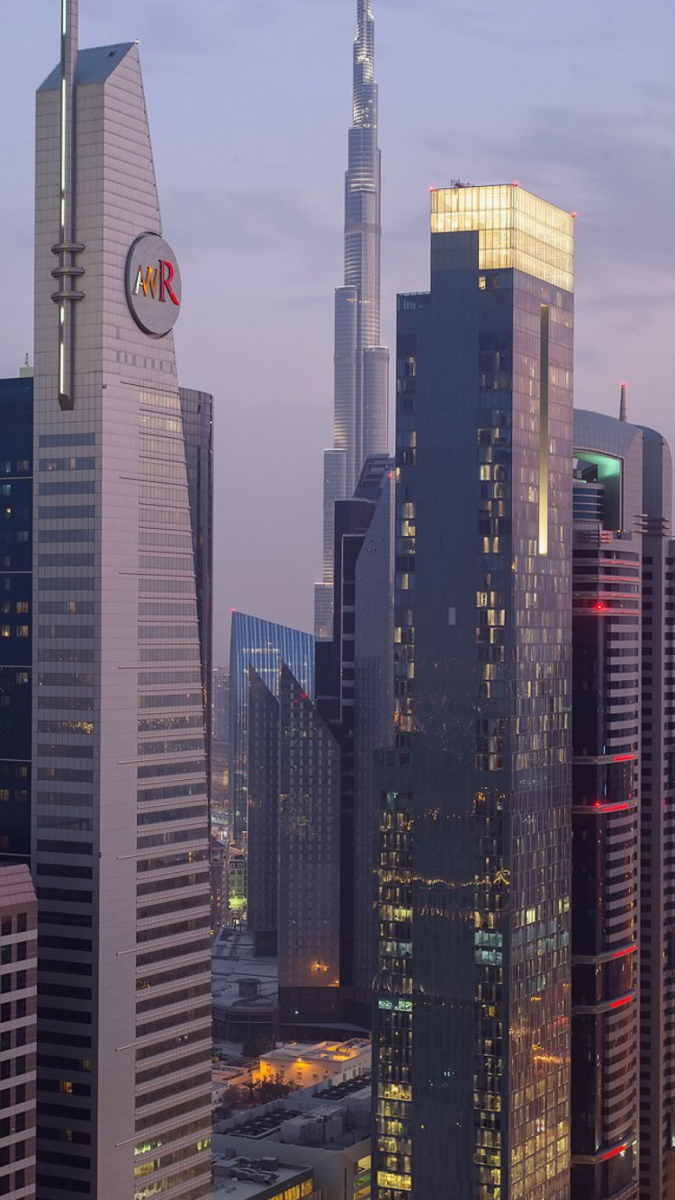 City Buildings Under Gray Sky During Daytime. Wallpaper in 750x1334 Resolution