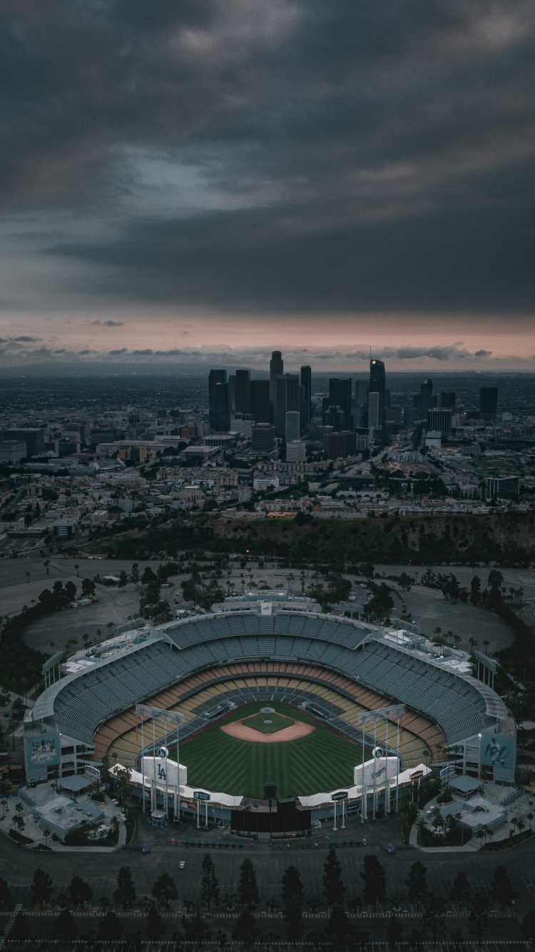 Aerial View of City Buildings During Night Time. Wallpaper in 750x1334 Resolution