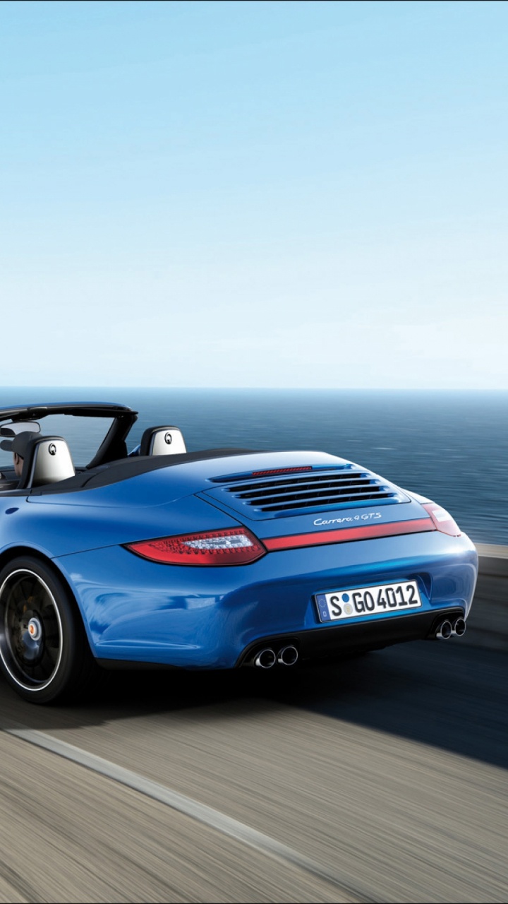 Blue Convertible Car on Road During Daytime. Wallpaper in 720x1280 Resolution