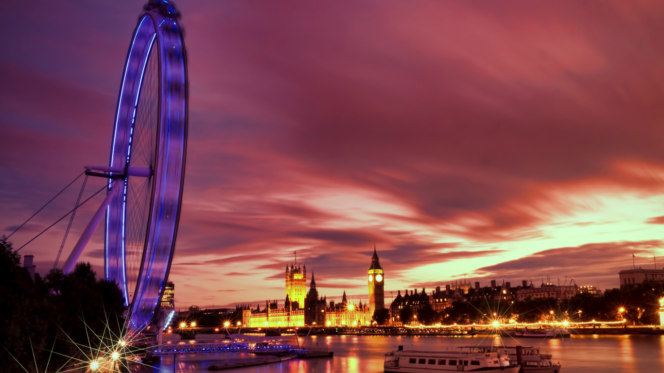 Riesenrad in Der Nähe Eines Gewässers Während Der Nacht. Wallpaper in 1366x768 Resolution