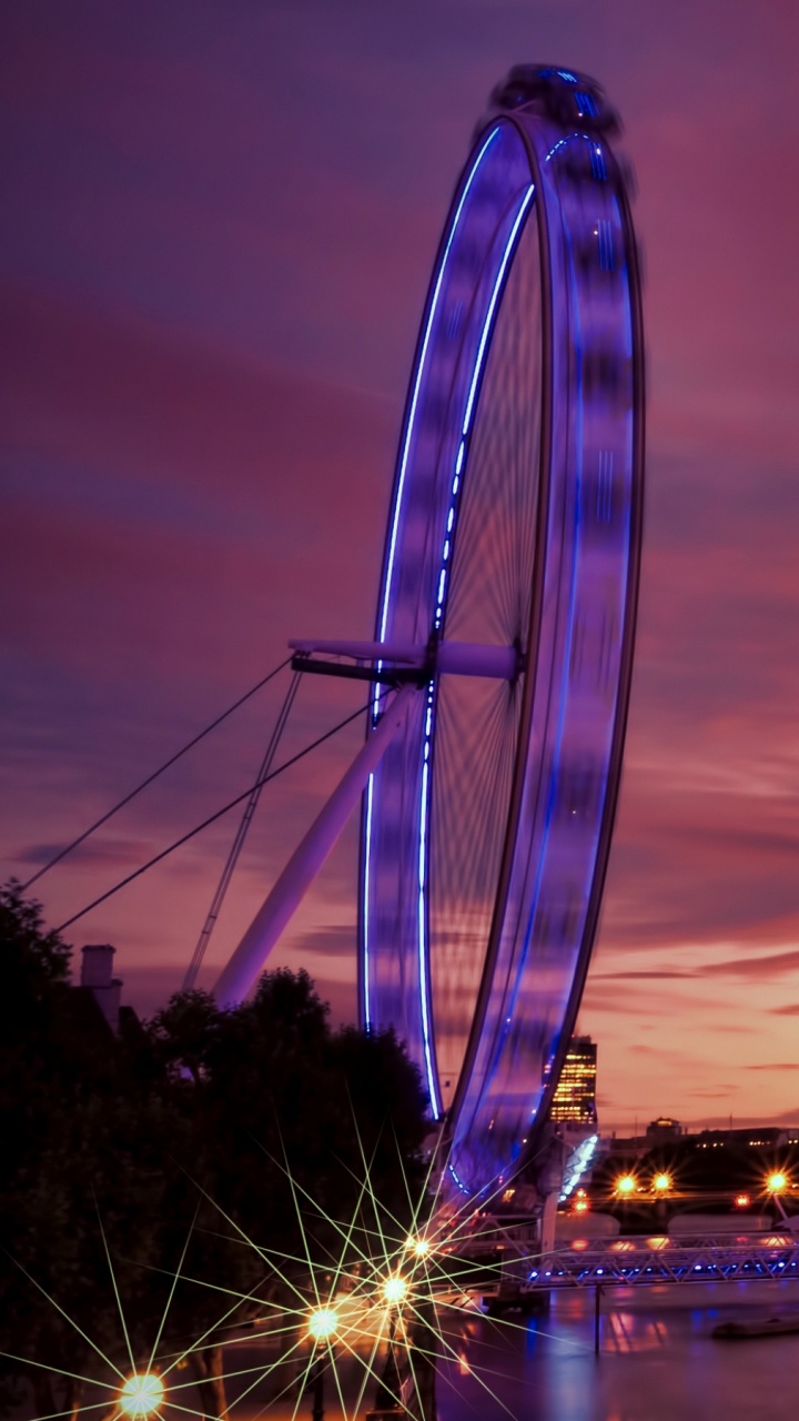 Ferris Wheel Near Body of Water During Night Time. Wallpaper in 720x1280 Resolution