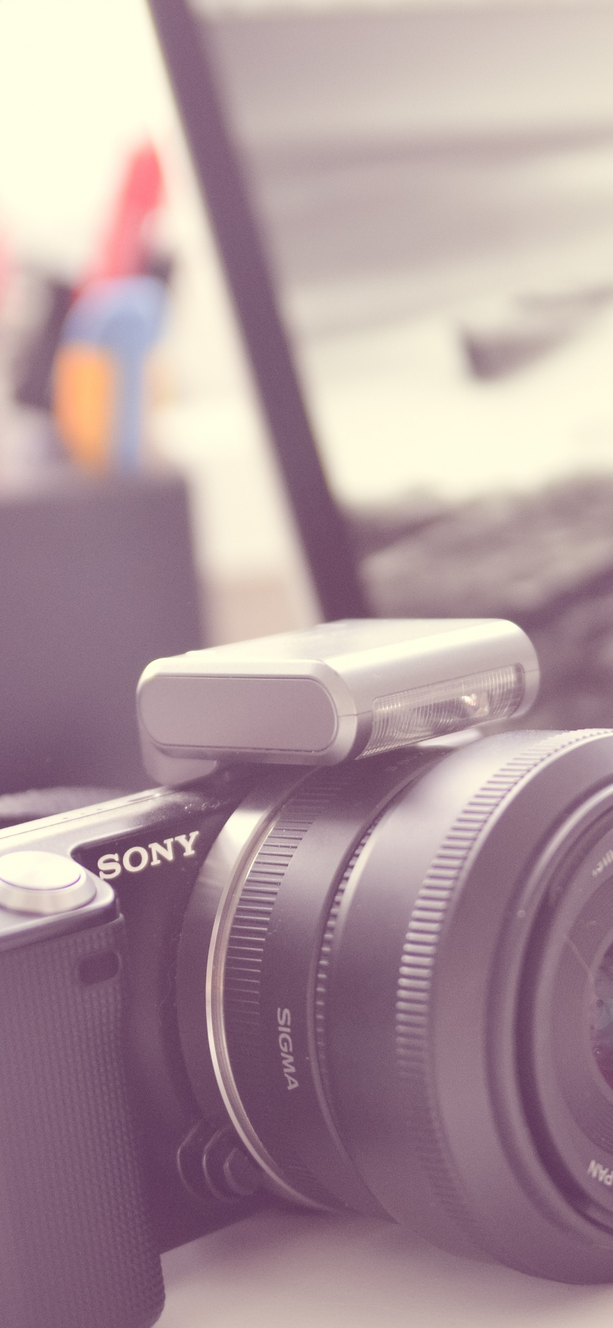 Black and Silver Canon Dslr Camera on Macbook Pro. Wallpaper in 1242x2688 Resolution