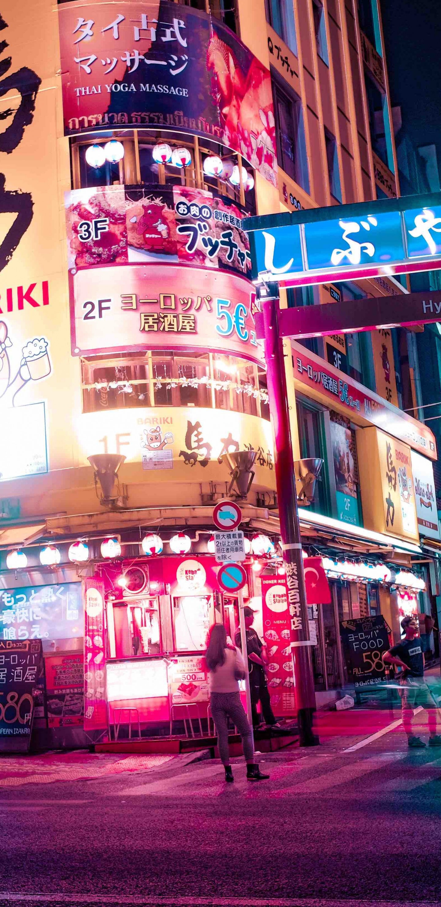 People Walking on Street During Night Time. Wallpaper in 1440x2960 Resolution
