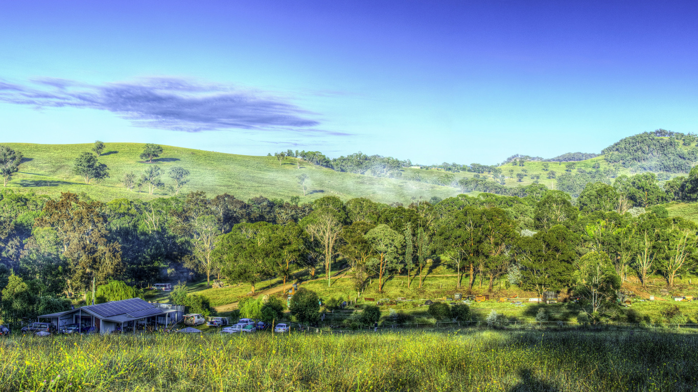 Green Trees and Mountains Under Blue Sky During Daytime. Wallpaper in 1366x768 Resolution
