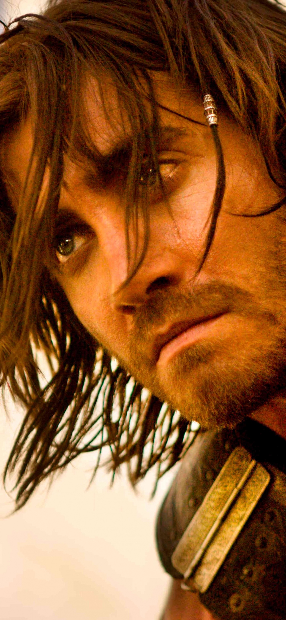 Homme en Veste Marron et Noire. Wallpaper in 1125x2436 Resolution