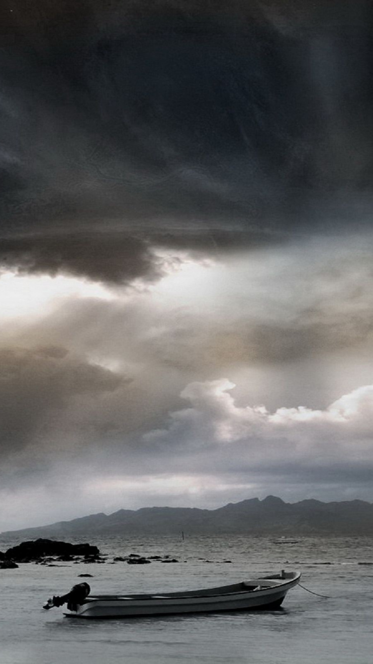 White Boat on Water Under Cloudy Sky. Wallpaper in 750x1334 Resolution