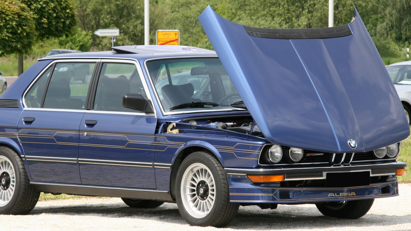 Blue Car on Gray Asphalt Road During Daytime. Wallpaper in 1366x768 Resolution