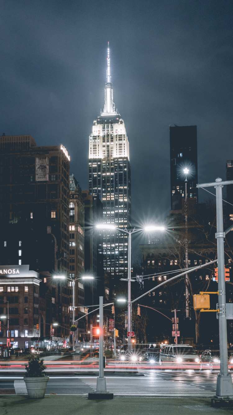 White and Black Concrete Building During Night Time. Wallpaper in 750x1334 Resolution