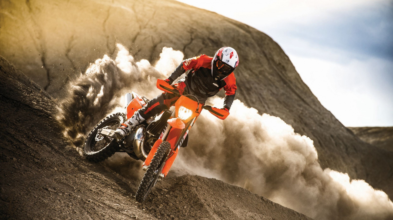 Hombre en Traje de Motocross Naranja y Negro Montando Motocross Dirt Bike. Wallpaper in 1366x768 Resolution