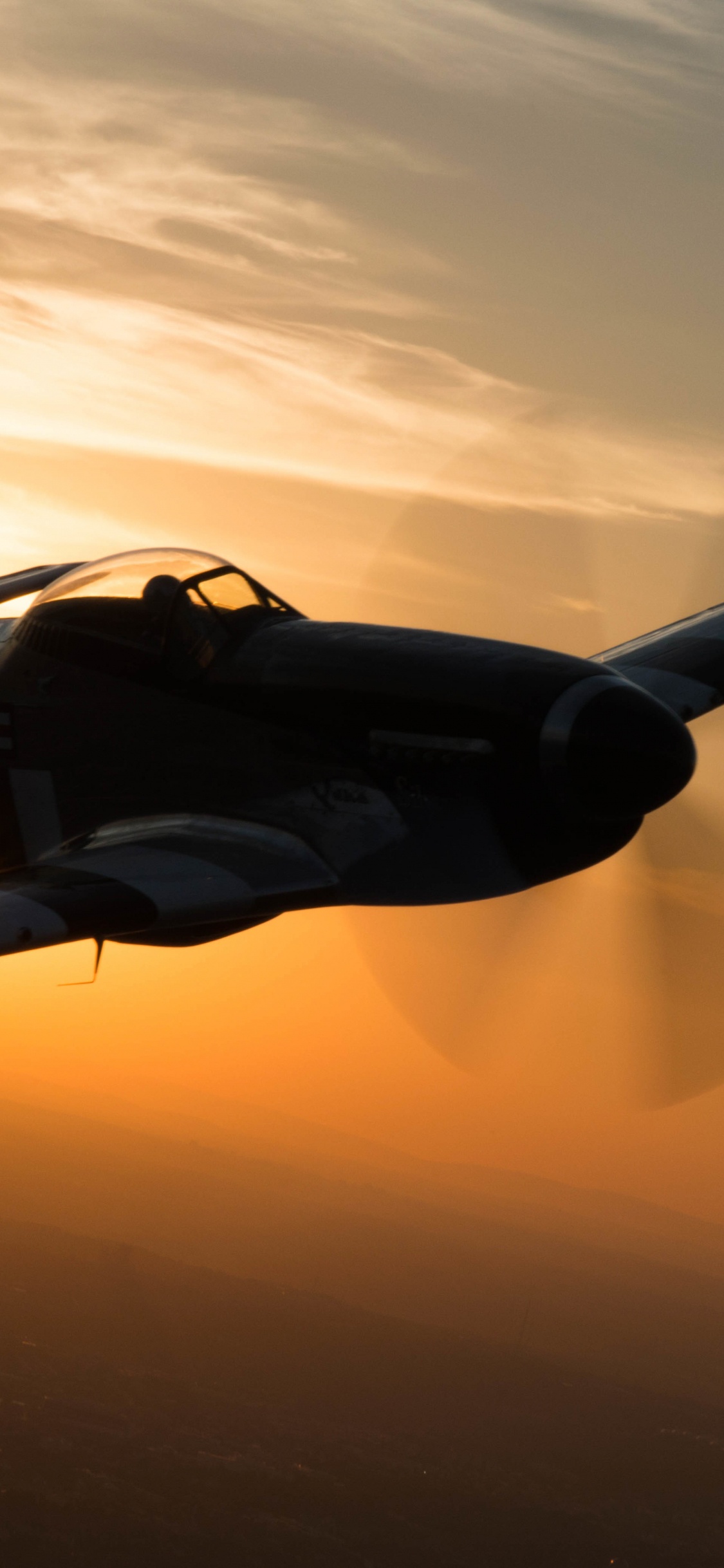 Black and Yellow Plane in The Sky. Wallpaper in 1125x2436 Resolution