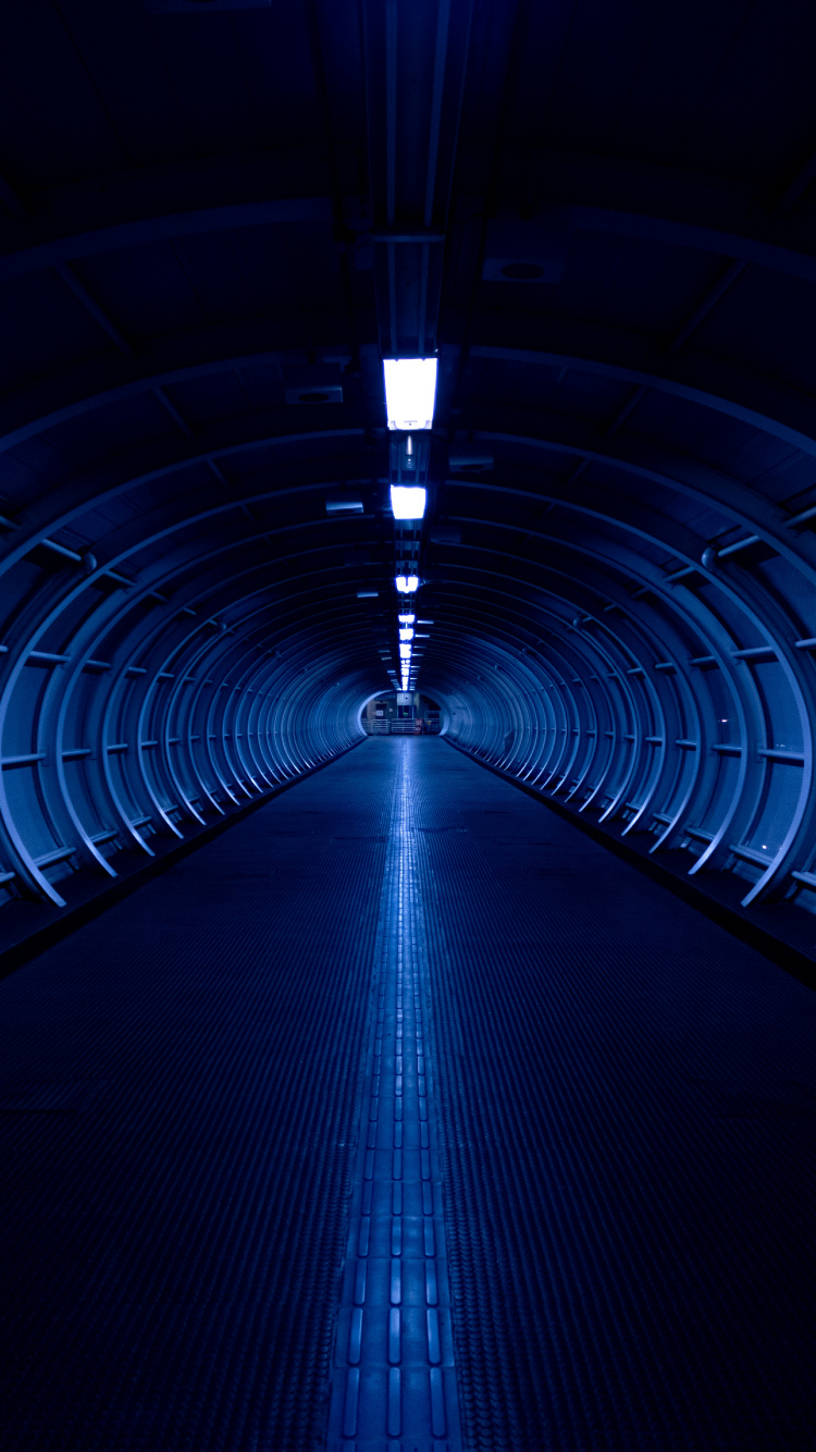 Blue and White Tunnel With Lights. Wallpaper in 750x1334 Resolution