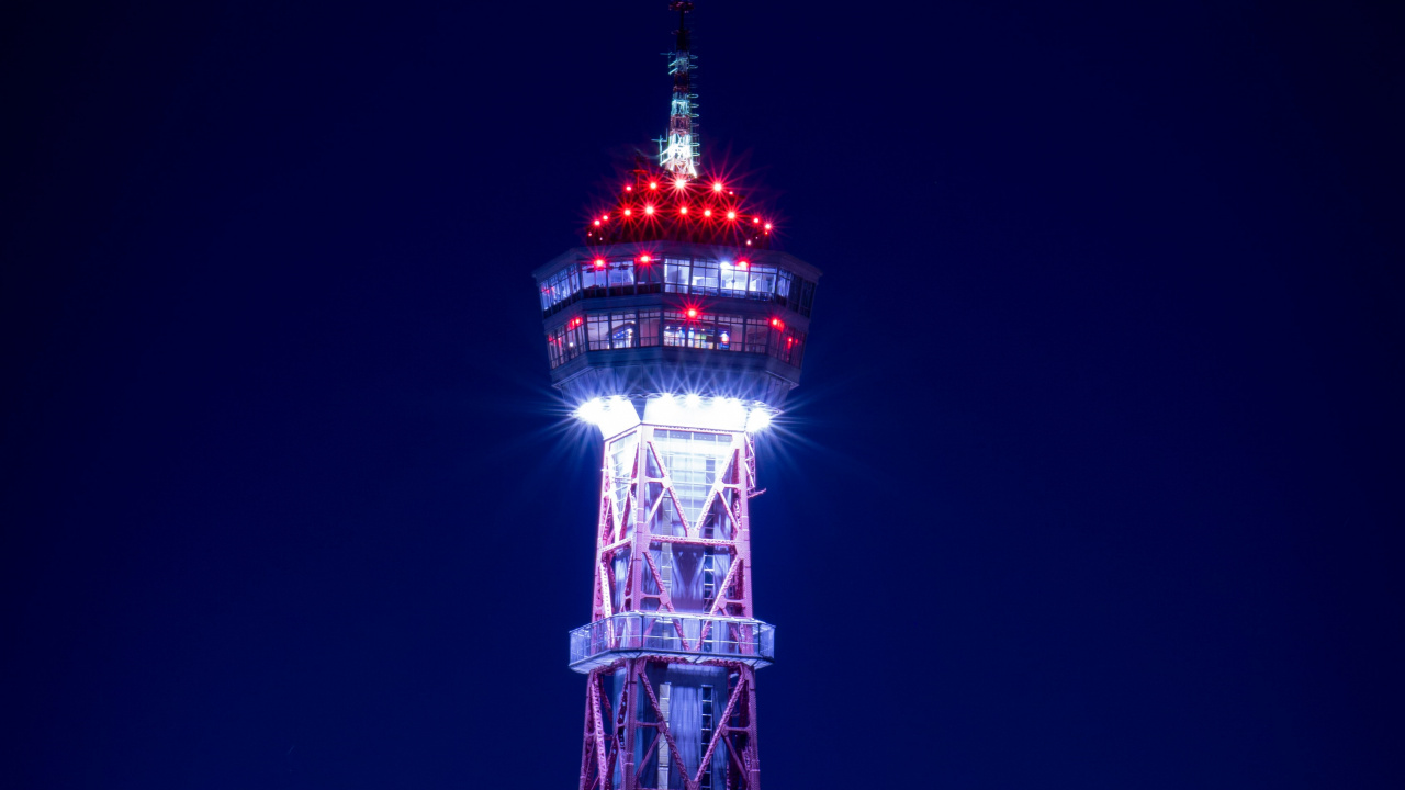 Red and White Tower During Night Time. Wallpaper in 1280x720 Resolution
