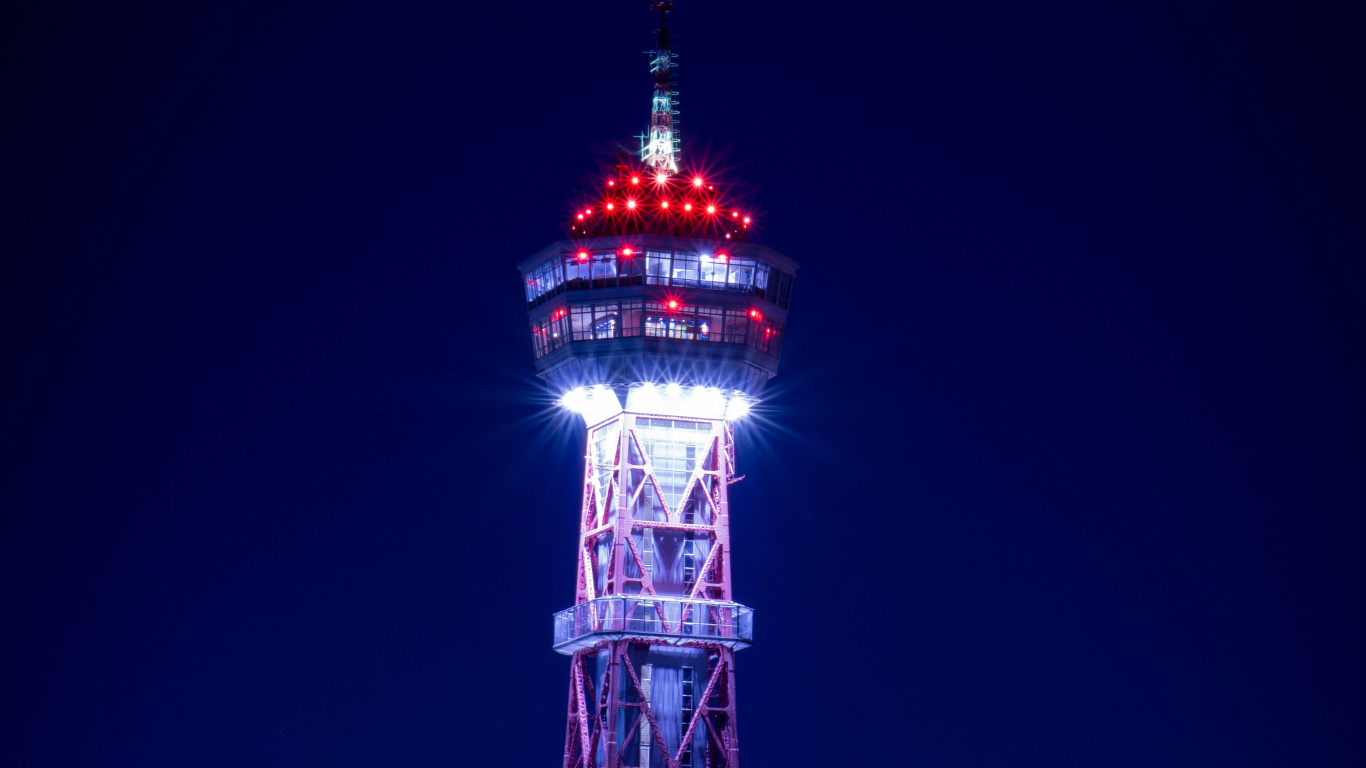 Red and White Tower During Night Time. Wallpaper in 1366x768 Resolution