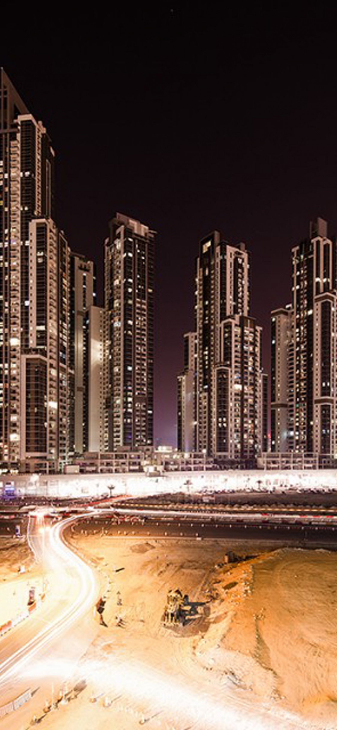 Immeubles de Grande Hauteur Près D'un Plan D'eau Pendant la Journée. Wallpaper in 1125x2436 Resolution