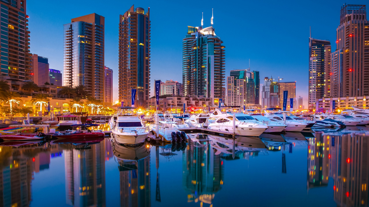 White and Blue Boat on Water Near City Buildings During Night Time. Wallpaper in 1280x720 Resolution