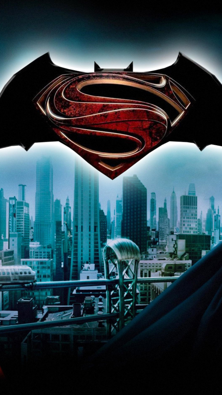 Person in Black Hoodie Looking at City Buildings During Night Time. Wallpaper in 750x1334 Resolution