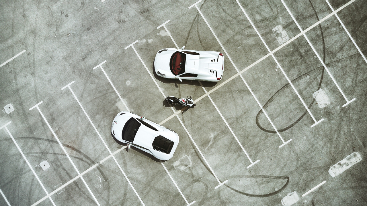 White Car on Gray Concrete Floor. Wallpaper in 1280x720 Resolution