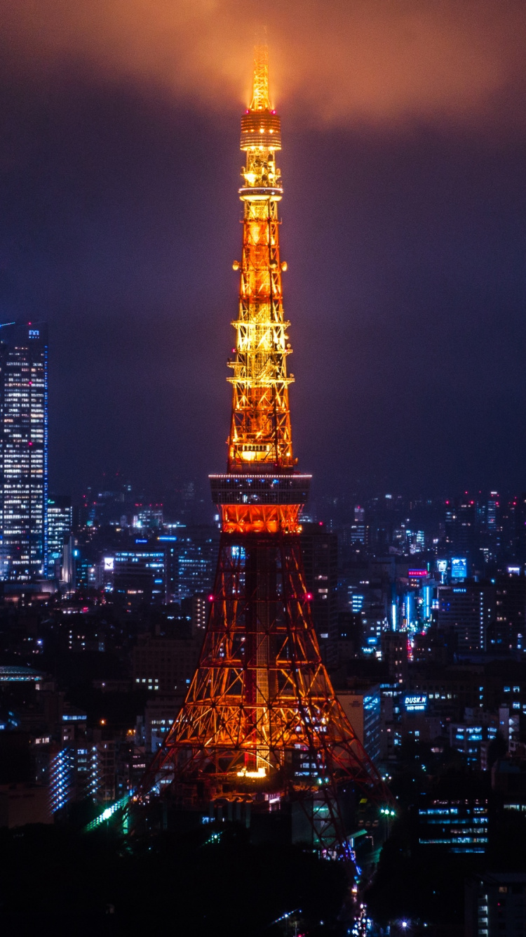 Eiffel Tower in Paris During Night Time. Wallpaper in 750x1334 Resolution