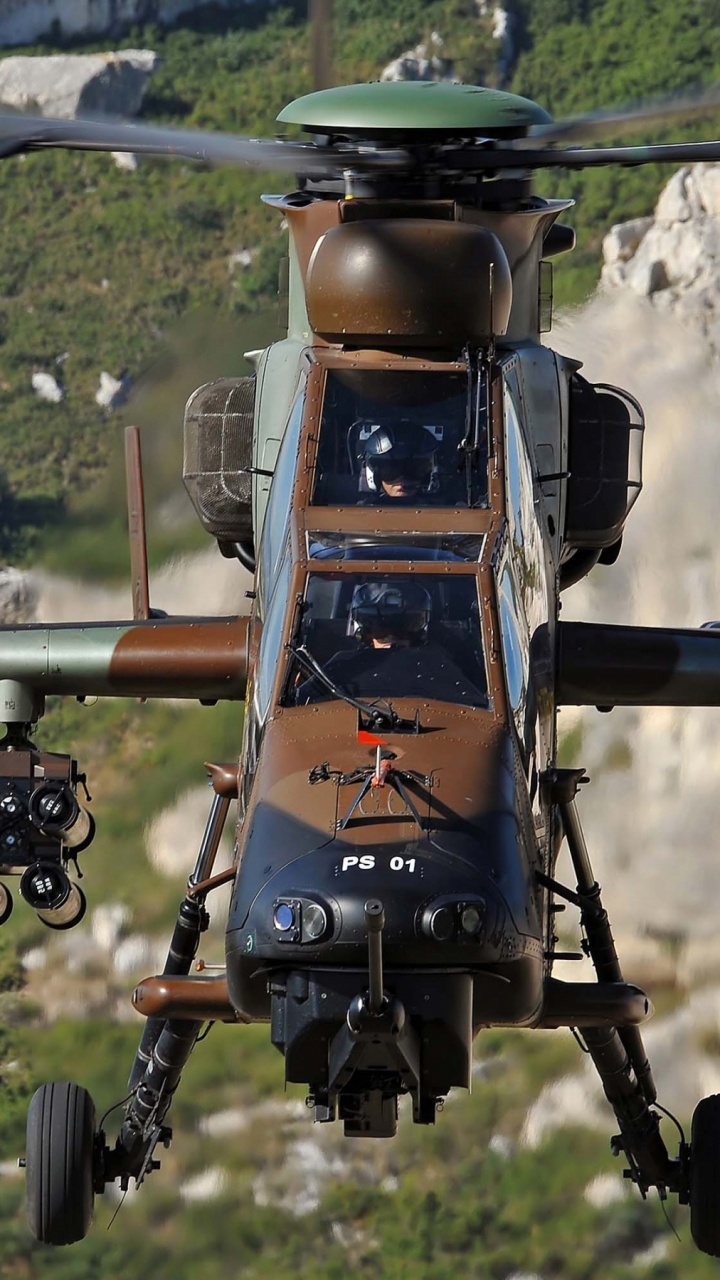 Black and Gray Drone on Brown Rock During Daytime. Wallpaper in 720x1280 Resolution