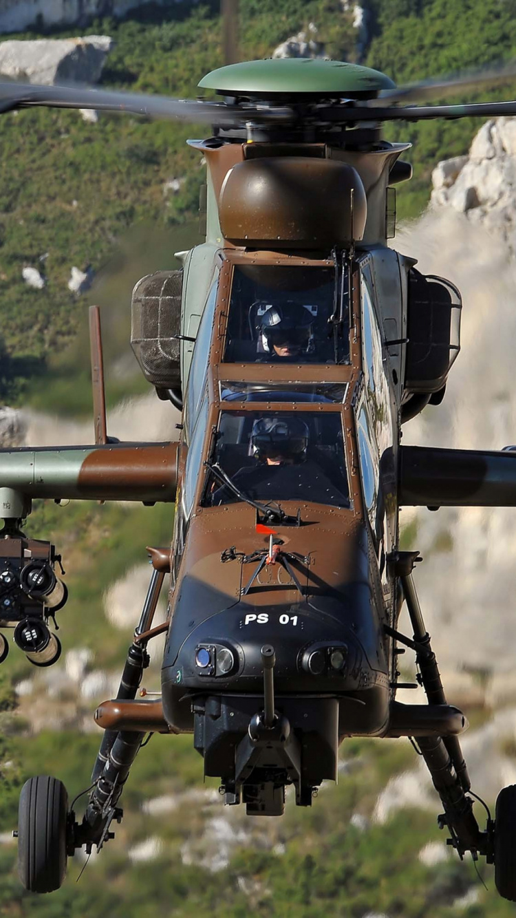 Black and Gray Drone on Brown Rock During Daytime. Wallpaper in 750x1334 Resolution