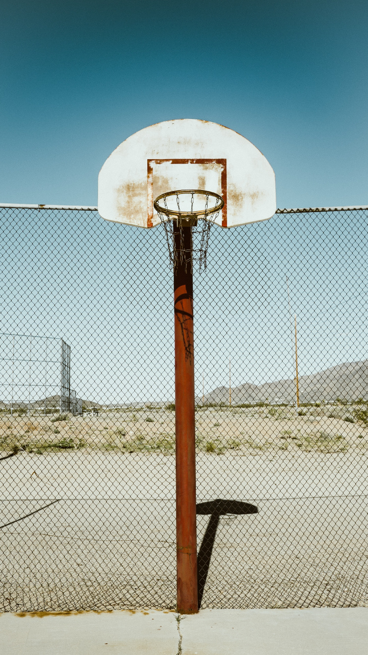 White and Brown Basketball Hoop. Wallpaper in 750x1334 Resolution