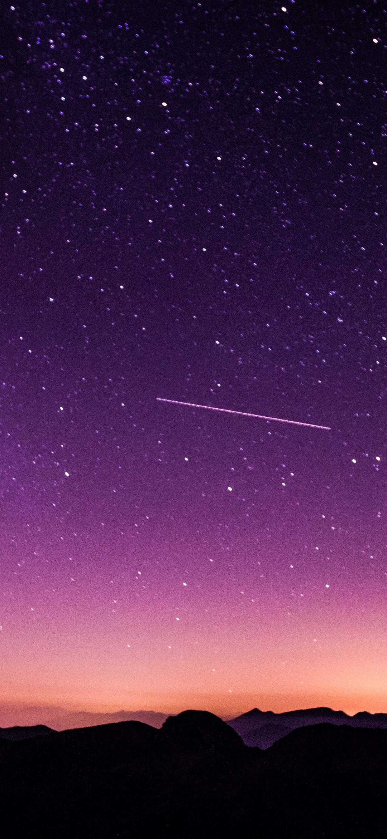 Silhouette of Mountains Under Purple Sky. Wallpaper in 1242x2688 Resolution