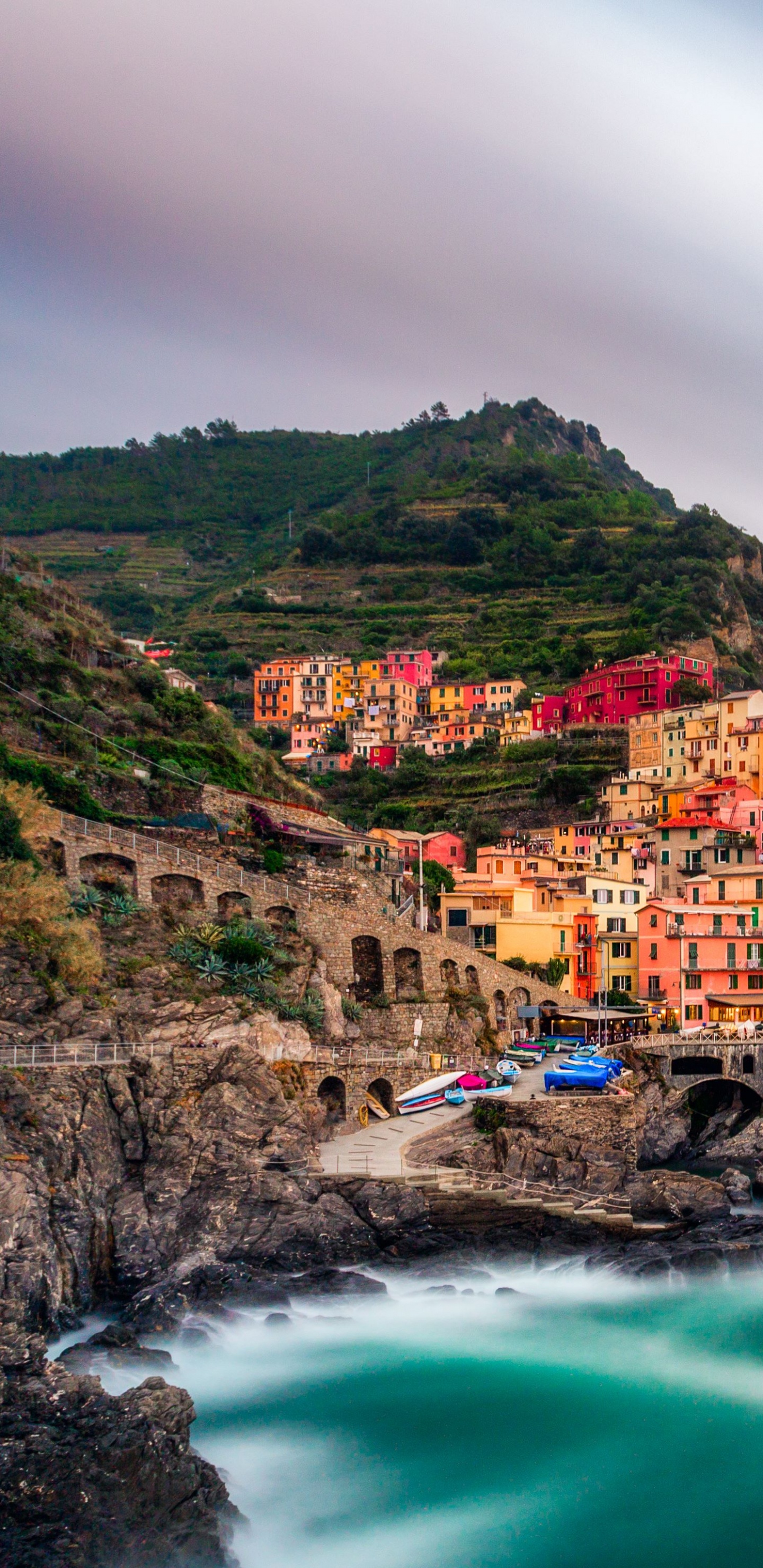 Houses on Mountain Near Body of Water During Daytime. Wallpaper in 1440x2960 Resolution