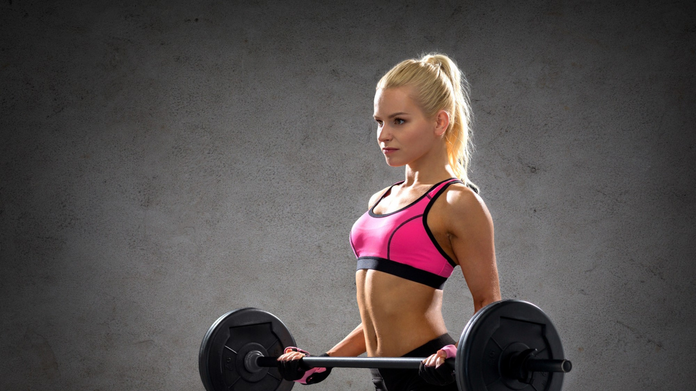 Girl in Pink Sports Bra and Pink Shorts Holding Black Dumbbell. Wallpaper in 1366x768 Resolution