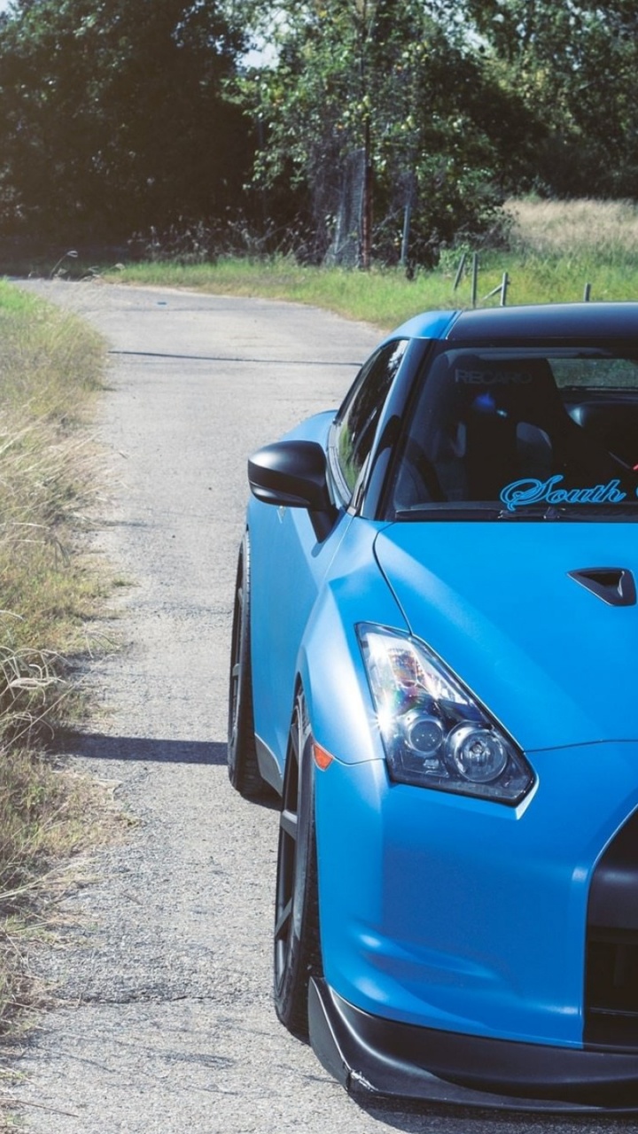 BMW m 3 Azul en la Carretera Durante el Día. Wallpaper in 720x1280 Resolution