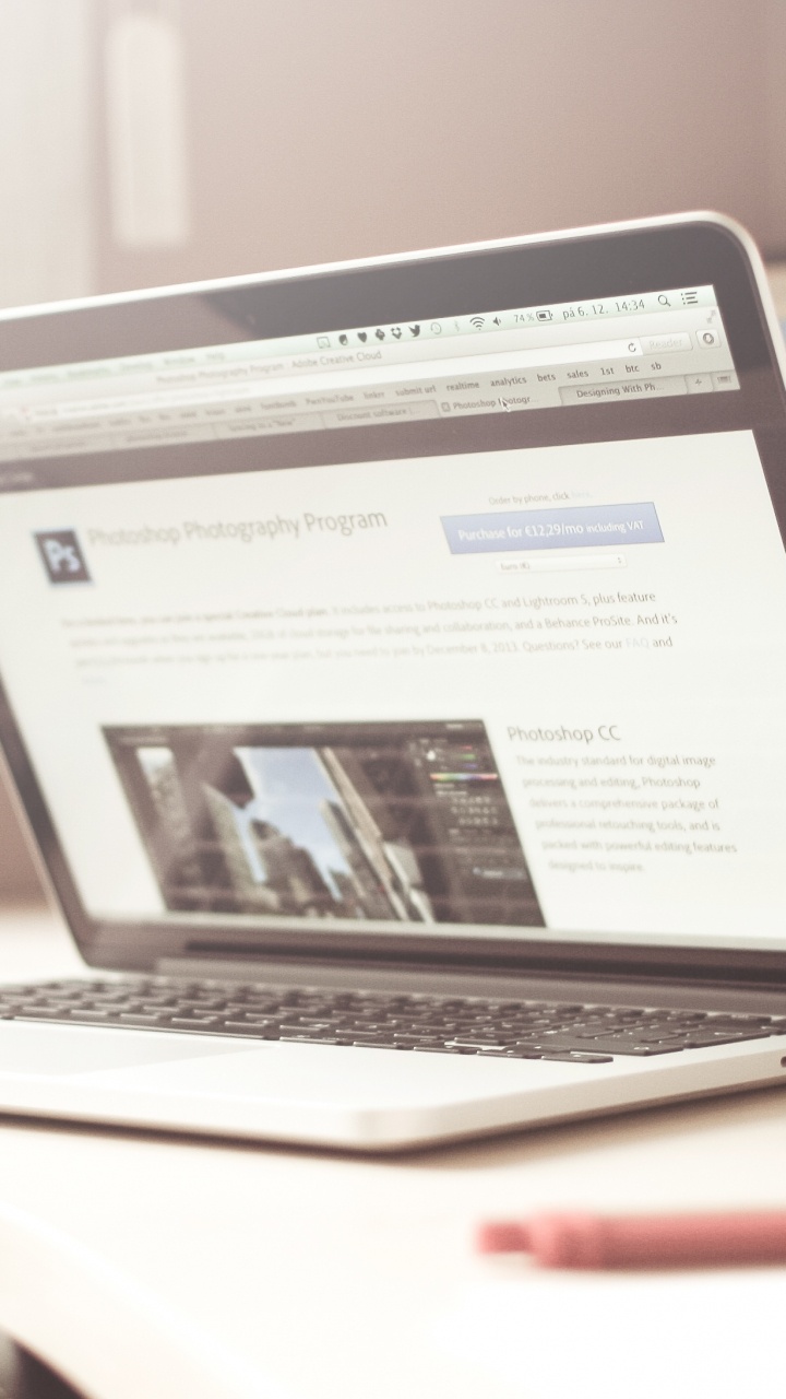 Macbook Air on White Table. Wallpaper in 720x1280 Resolution