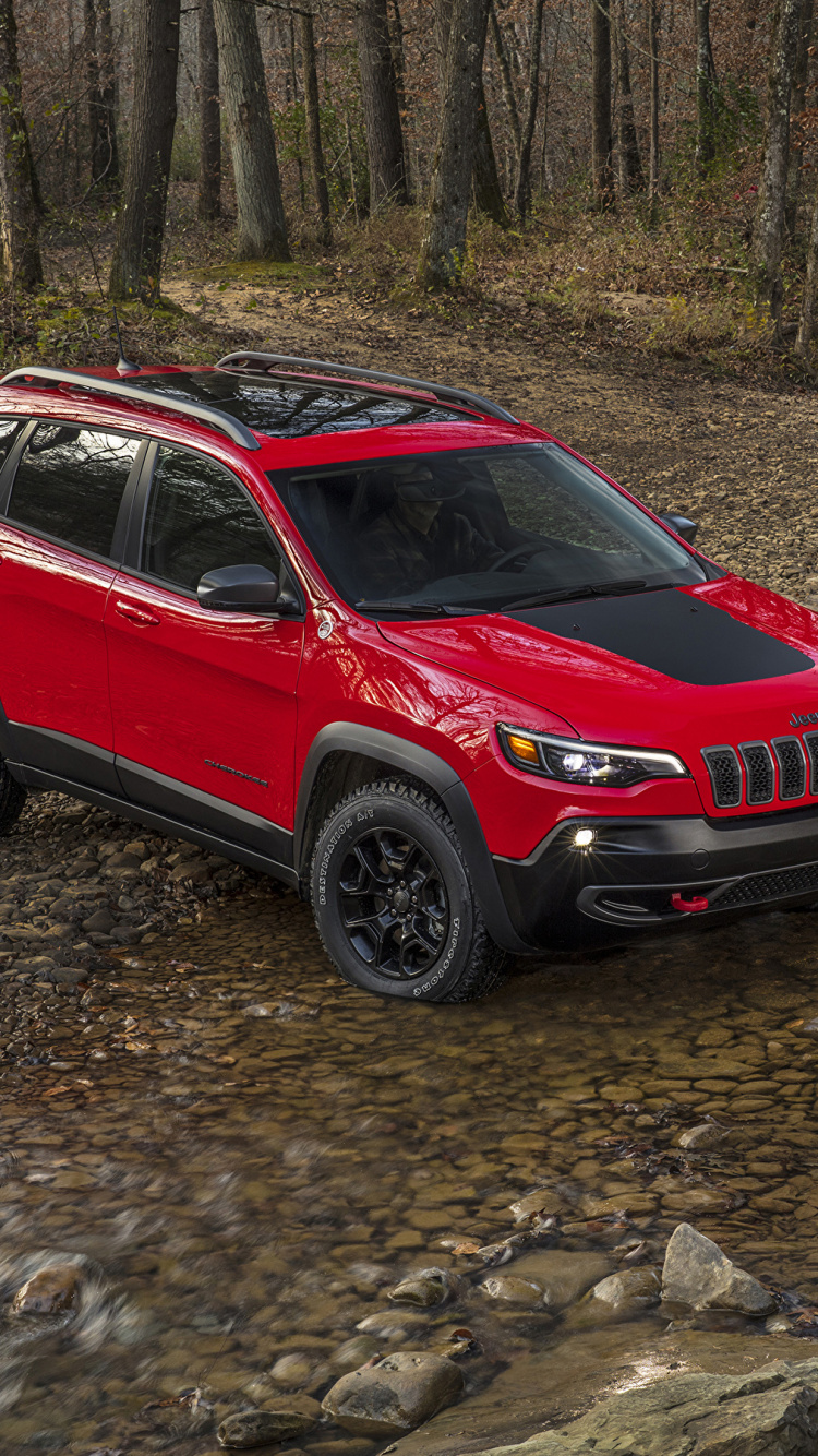 Red and Black Chevrolet Camaro on River. Wallpaper in 750x1334 Resolution