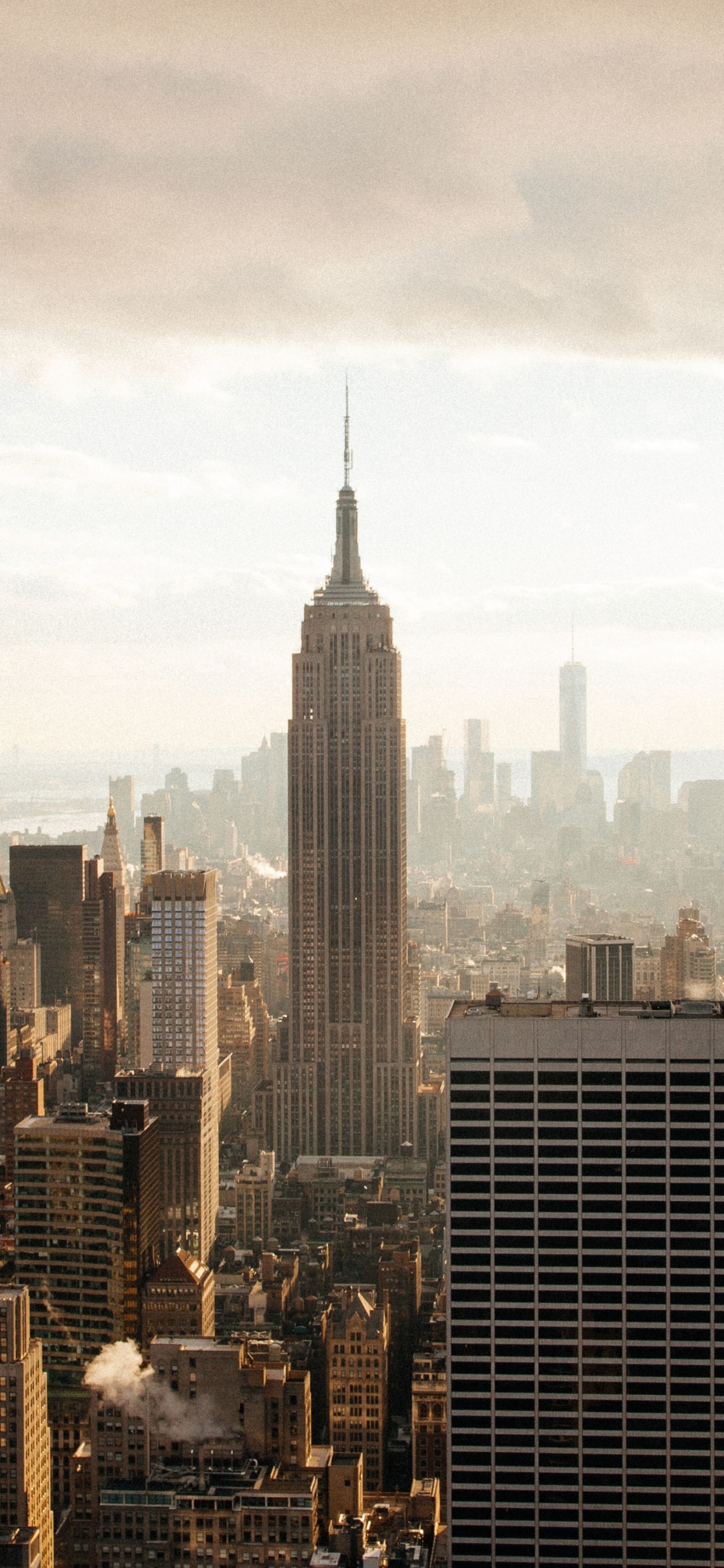 la Ville de New York, Radio City Music Hall, Gratte-ciel, Bâtiment, Atmosphère. Wallpaper in 1125x2436 Resolution