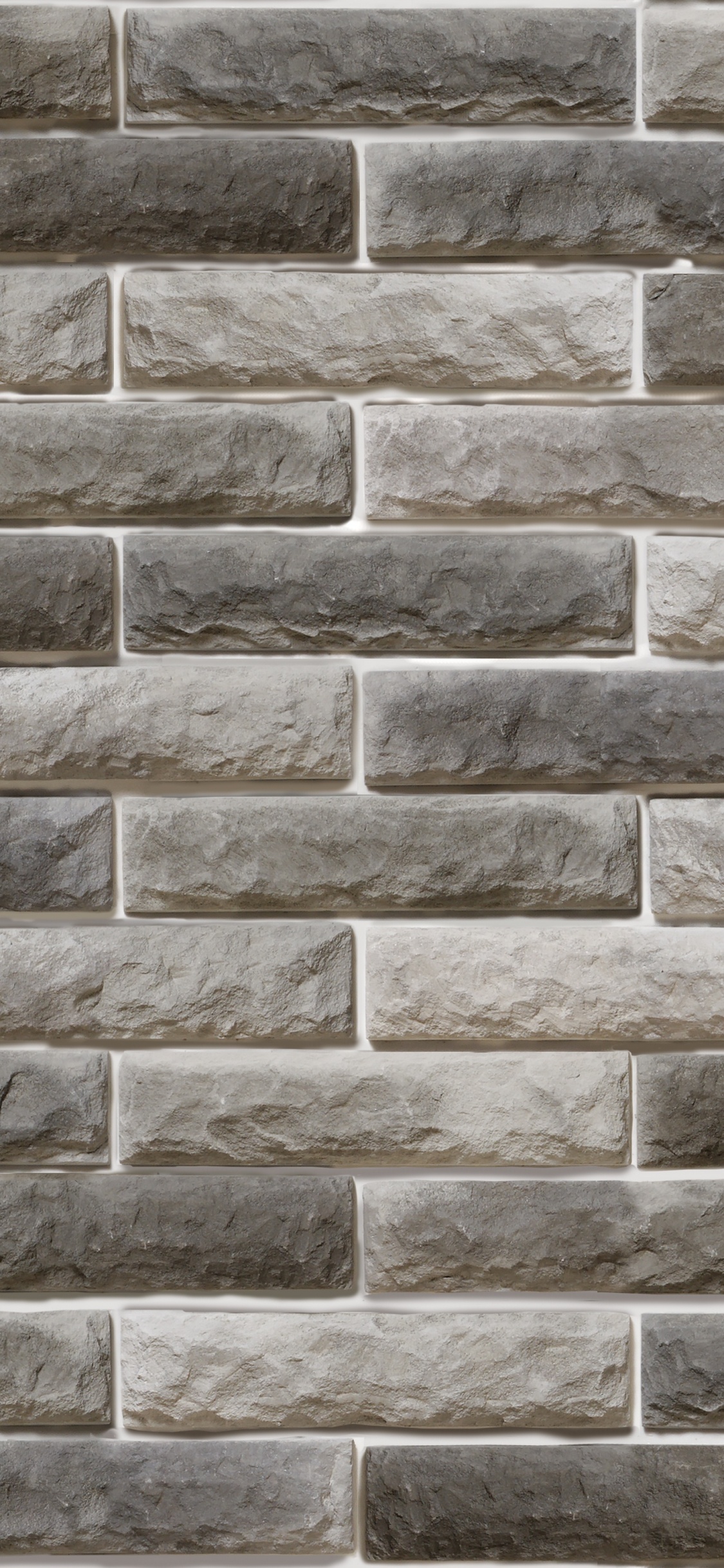 Brown and Gray Brick Wall. Wallpaper in 1125x2436 Resolution
