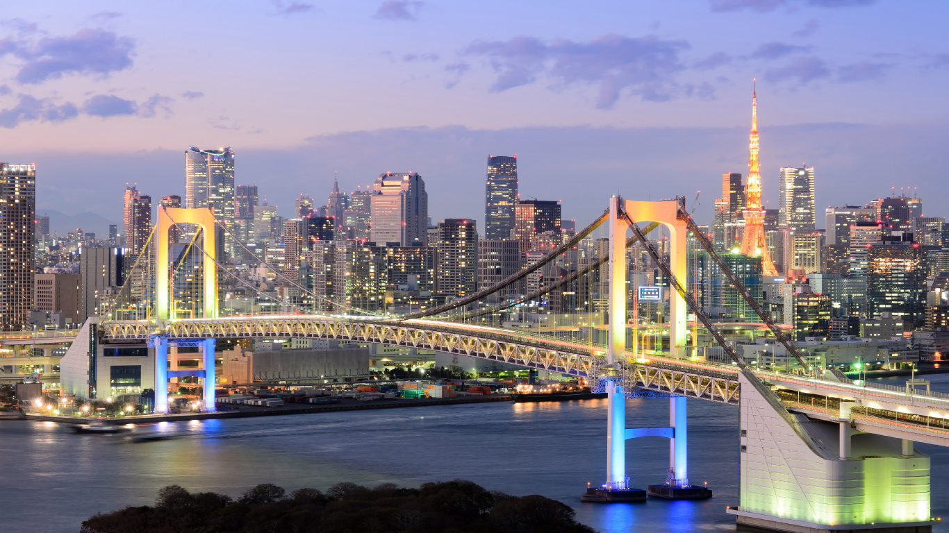 White Bridge Over Body of Water During Night Time. Wallpaper in 1366x768 Resolution
